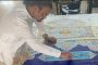 ২০০ কেজি স্বর্ণ দিয়ে বিশ্বের বৃহত্তম কোরআন তৈরি পাকিস্তানি শিল্পীর